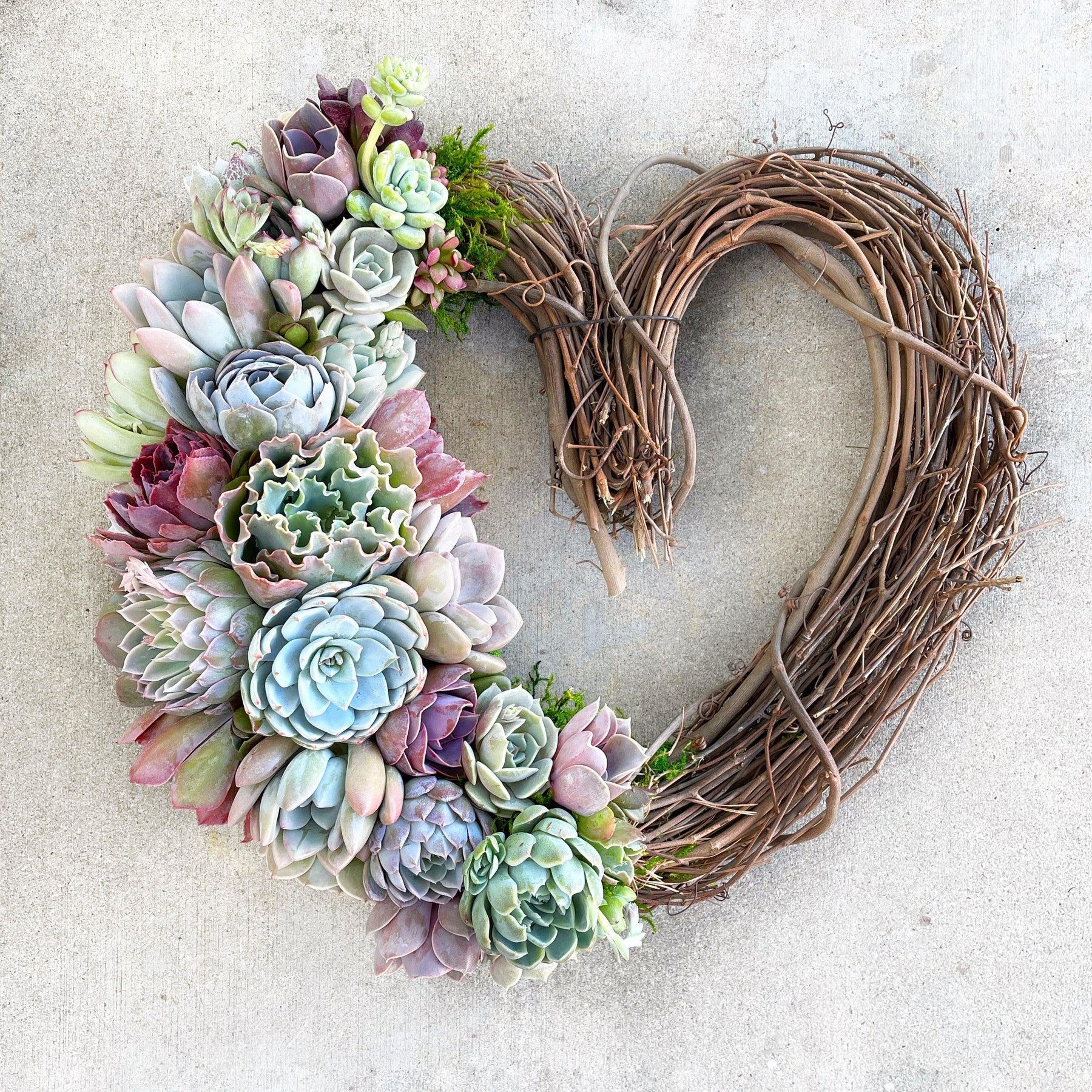 Rebecca Heart-Shaped Grapevine Wreath Trimmed With Succulents.